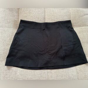 Black Mini Skirt. Shorts built in. Medium. Soft material. Only been worn once!
